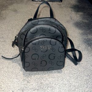 Guess logo purse mini backpack.